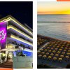 Hotel illuminato e spiaggia al tramonto.